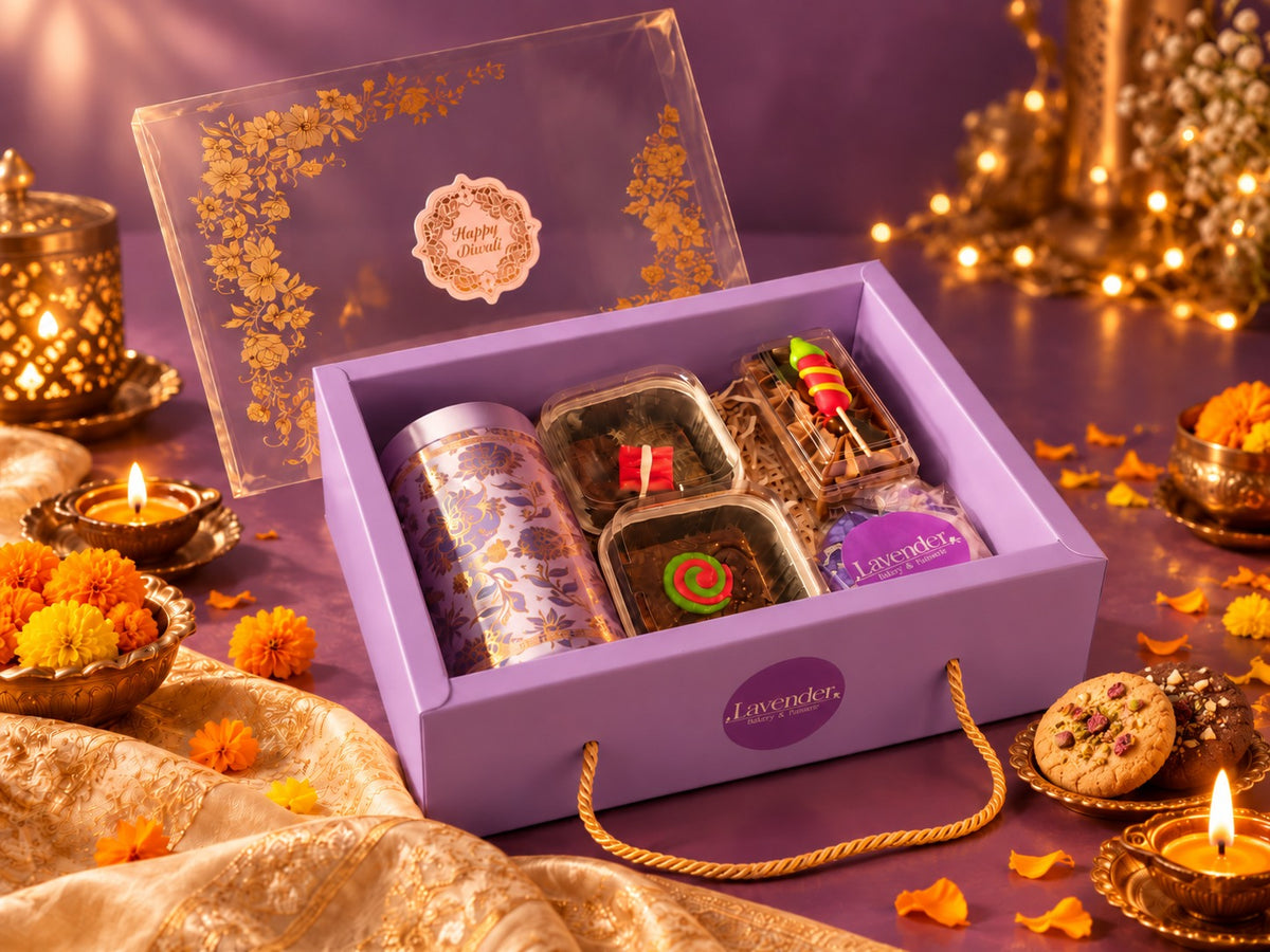 Diwali Celebration Dessert Hamper with brownies, mousse, chocolates, cookies and festive lavender packaging