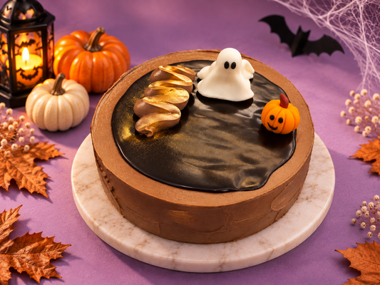 Spooky Swiss Chocolate Cake with Halloween decorations