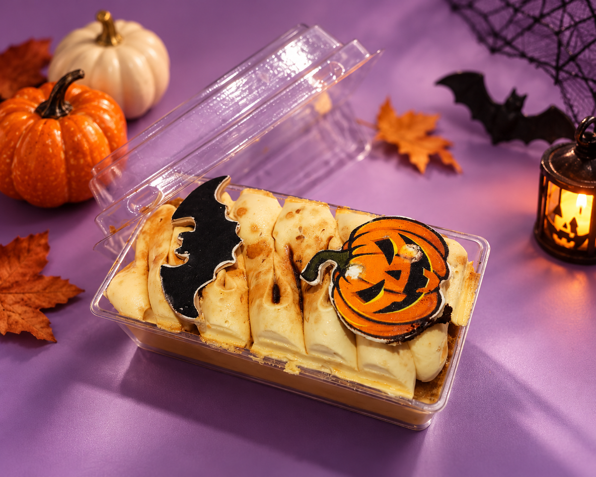Spooky Tiramisu Tres Leches with Halloween decorations