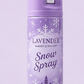 A product lineup graphic showing lavender and silver party accessories on a light lavender background, including a gold and lavender crown, lavender snow spray cans, a silver tiara, a lavender party popper, a lavender spiral candle, and two silver sparkles.