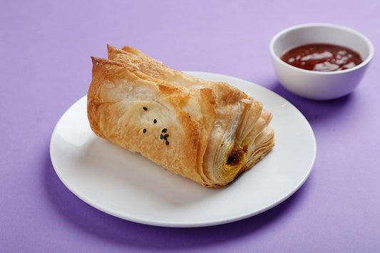 Crispy Paneer Puff filled with seasoned paneer