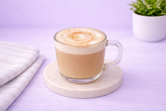Hot Spanish Latte with espresso, steamed milk, and creamy foam served in a glass cup