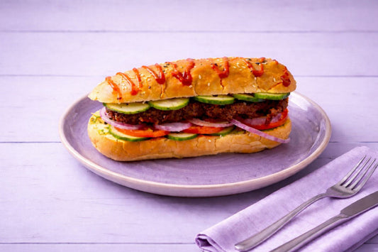 Veg Hot Dog filled with vegetable patty, fresh vegetables and sauces